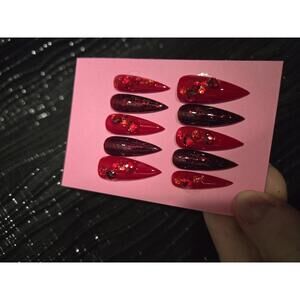 Long red stiletto nails custom made roses and bling